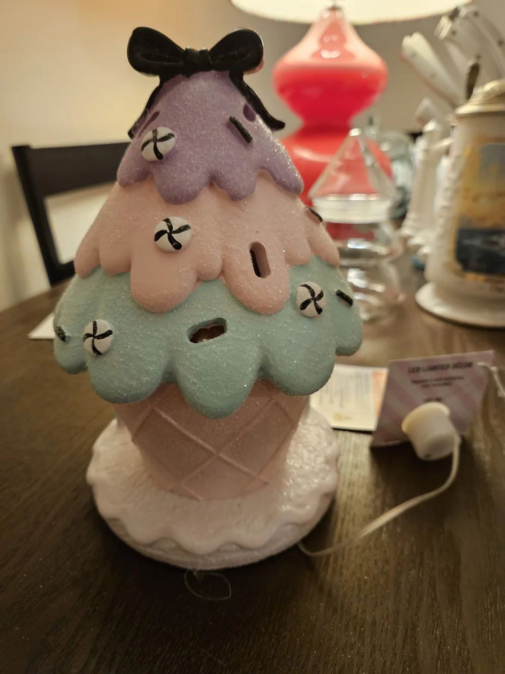 Whimsical Pastel Fairy House Figurine with Black Cat